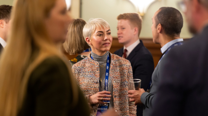 IAB members in discussion at a parliamentary event